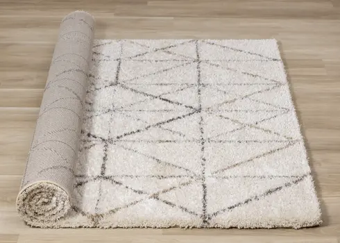 5' X 8' Cream And Gray Tribal Area Rug