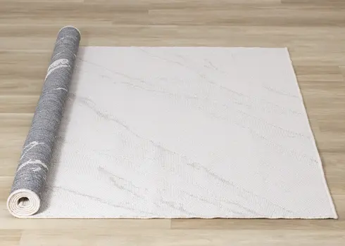 5' X 8' Cream And Gray Abstract Area Rug