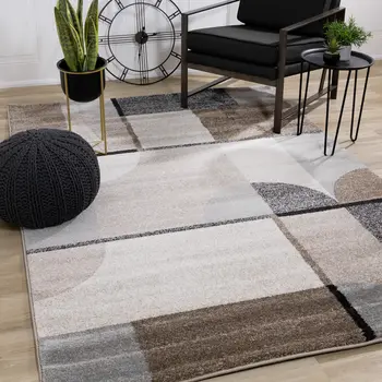 5' X 8' Cream And Gray Geometric Area Rug