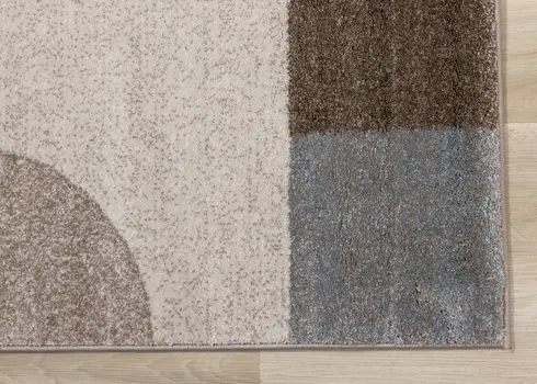 5' X 8' Cream And Gray Geometric Area Rug