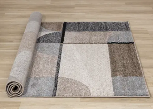 5' X 8' Cream And Gray Geometric Area Rug