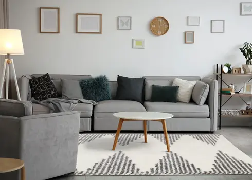 5' X 8' Cream And Gray Geometric Area Rug