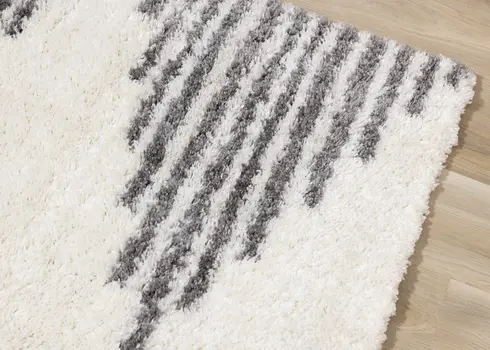 5' X 8' Cream And Gray Geometric Area Rug