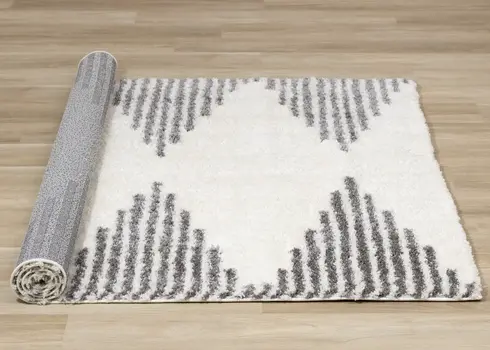5' X 8' Cream And Gray Geometric Area Rug