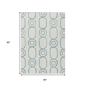 5' X 8' Teal Blue And Ivory Geometric Washable Indoor Outdoor Area Rug