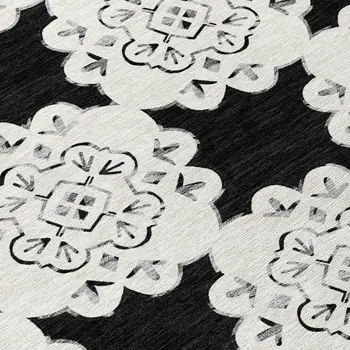 8' Black And Ivory Round Quatrefoil Washable Indoor Outdoor Area Rug