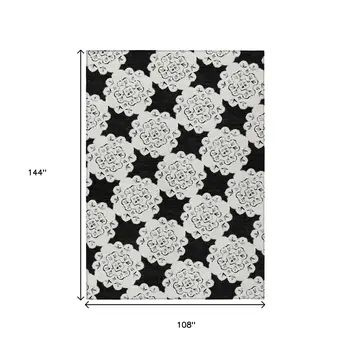 9' X 12' Black And Ivory Quatrefoil Washable Indoor Outdoor Area Rug