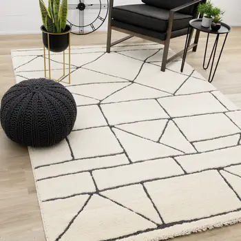 8' X 11' Cream And Black Geometric Area Rug