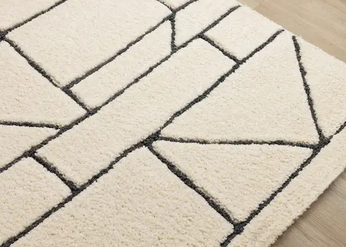 8' X 11' Cream And Black Geometric Area Rug