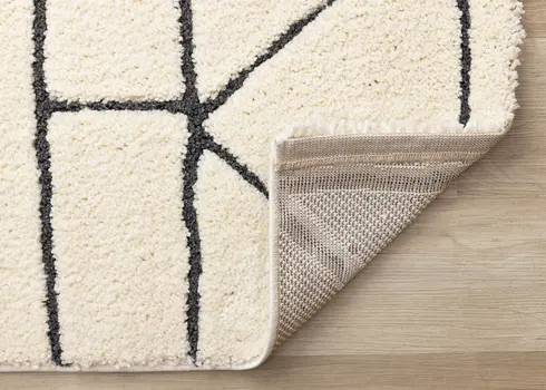 8' X 11' Cream And Black Geometric Area Rug