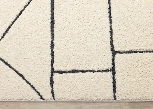 8' X 11' Cream And Black Geometric Area Rug