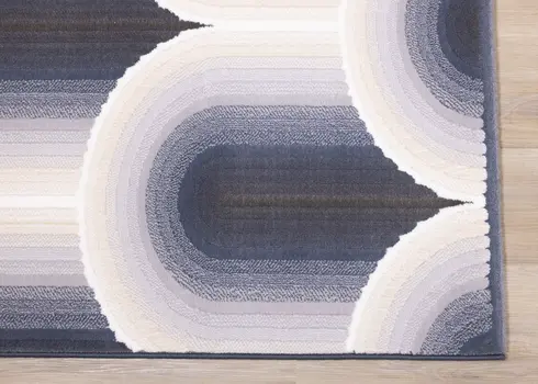 5' X 8' Cream And Blue Geometric Area Rug