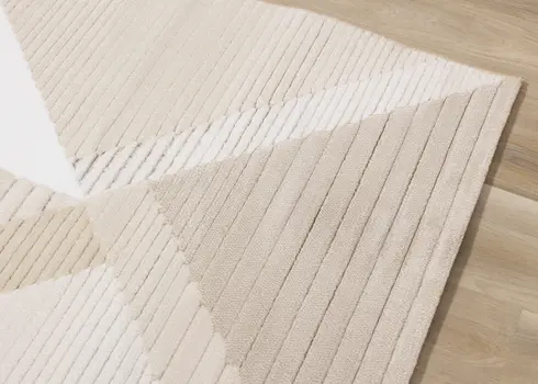 5' X 8' Beige And Cream Geometric Area Rug