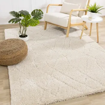 5' X 8' Cream And Beige Geometric Area Rug