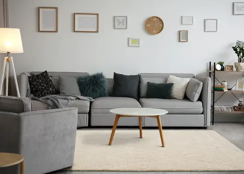 5' X 8' Cream And Beige Geometric Area Rug