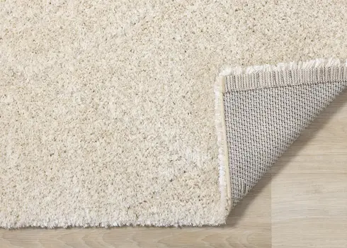5' X 8' Cream And Beige Geometric Area Rug