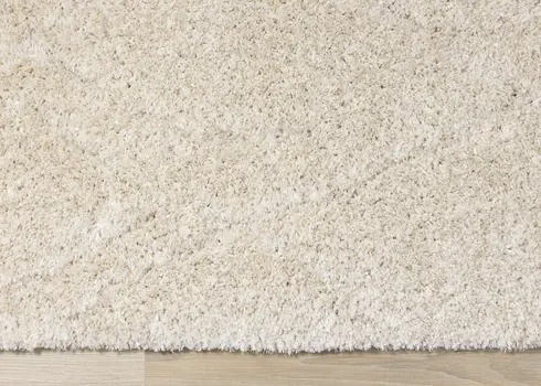 5' X 8' Cream And Beige Geometric Area Rug