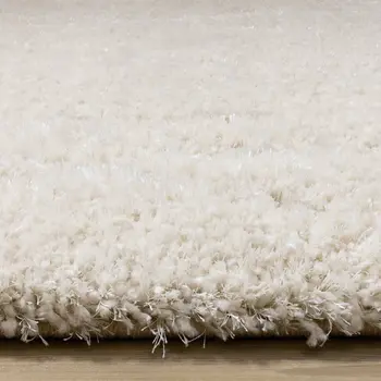 5' X 8' Cream And Beige Geometric Area Rug