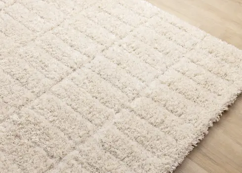 5' X 8' Cream And Beige Geometric Area Rug