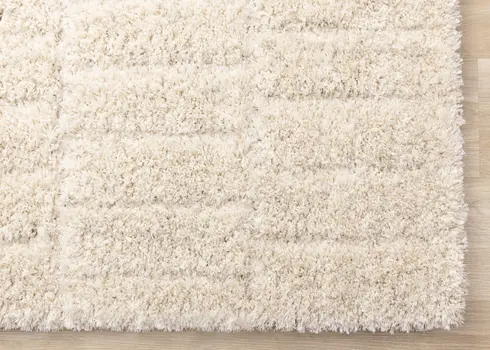 5' X 8' Cream And Beige Geometric Area Rug