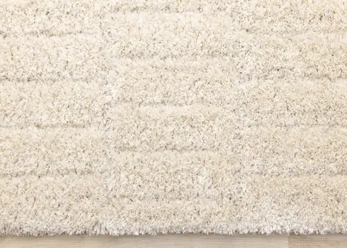 5' X 8' Cream And Beige Geometric Area Rug