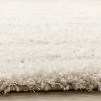 5' X 8' Cream And Beige Geometric Area Rug