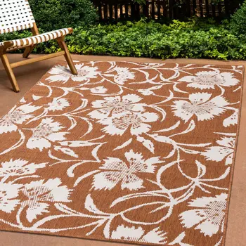7' X 10' Orange And White Botanical Leaves Area Rug