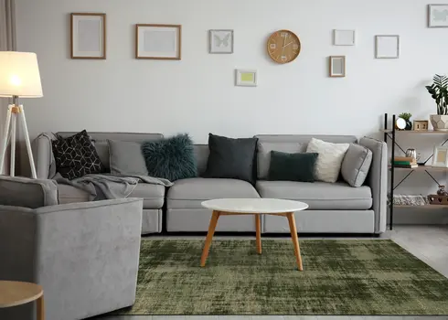 7' X 10' Green And Taupe Abstract Area Rug