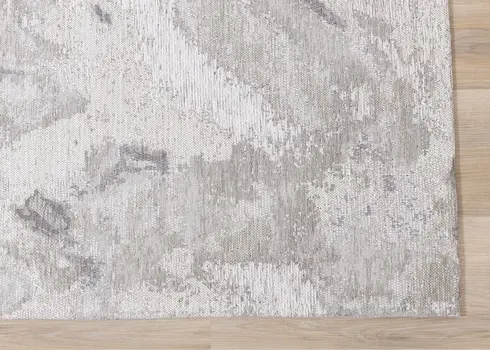 5' X 8' Cream And Gray Abstract Area Rug