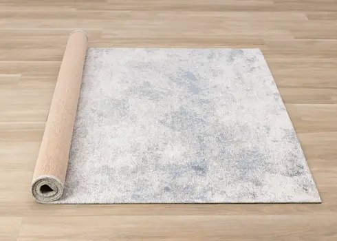 8' X 11' Cream And Blue Abstract Area Rug