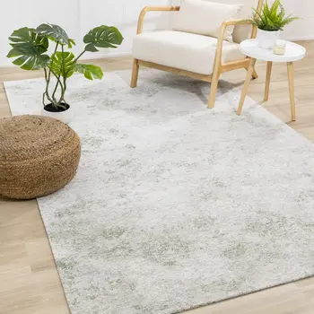 5' X 8' Cream And Green Abstract Area Rug