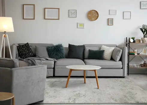 5' X 8' Cream And Green Abstract Area Rug