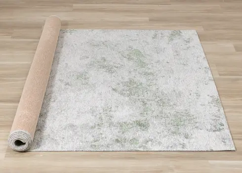 5' X 8' Cream And Green Abstract Area Rug