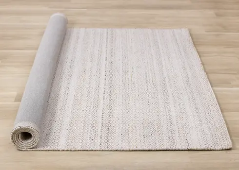 5' X 8' Cream And Beige Geometric Hand Woven Area Rug