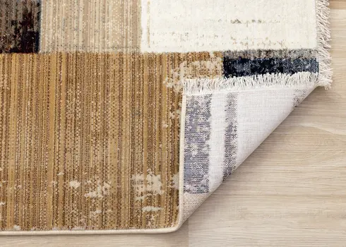 5' X 8' Beige And Orange Geometric Area Rug