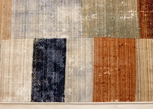 5' X 8' Beige And Orange Geometric Area Rug