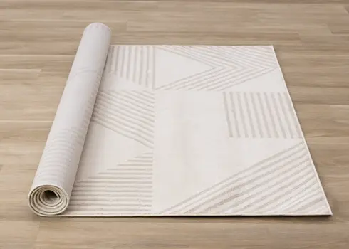 5' X 8' Cream And Beige Geometric Area Rug