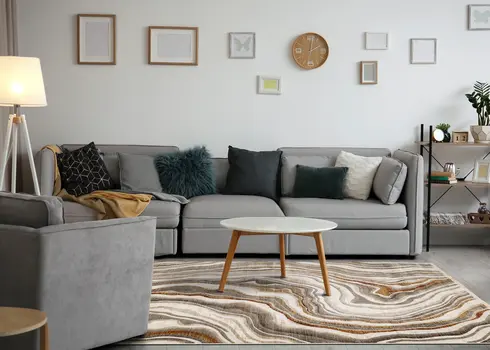 7' X 10' Cream And Beige Abstract Area Rug
