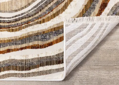 7' X 10' Cream And Beige Abstract Area Rug