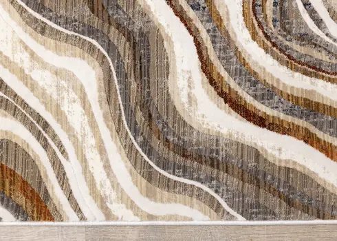 7' X 10' Cream And Beige Abstract Area Rug