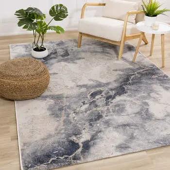 7' X 10' Blue And Cream Abstract Area Rug