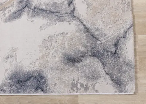7' X 10' Blue And Cream Abstract Area Rug