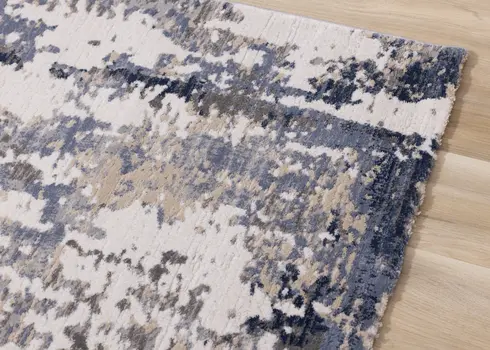 7' X 10' Blue And Beige Abstract Area Rug