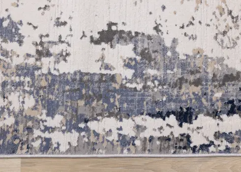 7' X 10' Blue And Beige Abstract Area Rug