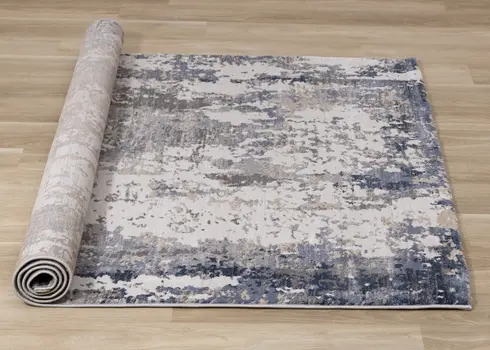 8' X 11' Blue And Beige Abstract Area Rug