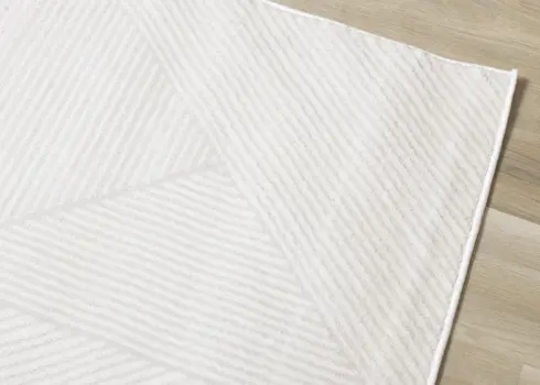 5' X 8' Cream And White Geometric Area Rug