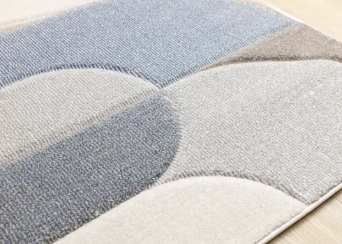5' X 8' Blue And Cream Geometric Area Rug