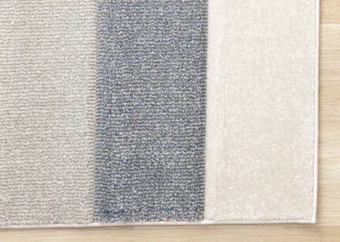 5' X 8' Blue And Cream Geometric Area Rug
