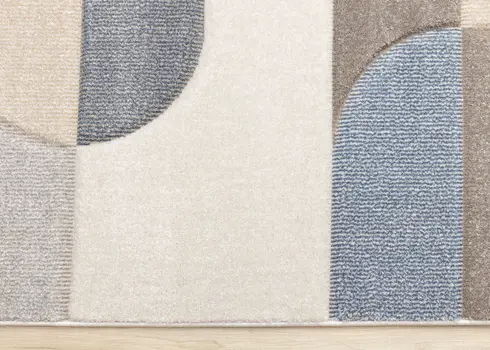 5' X 8' Blue And Cream Geometric Area Rug