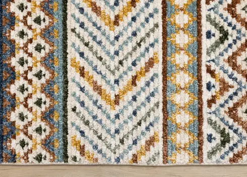 5' X 8' Cream And Blue Tribal Area Rug